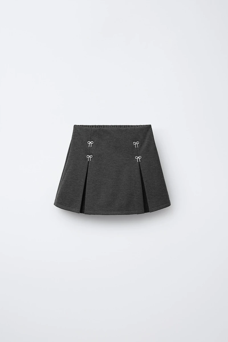 JUPE-SHORT À NŒUDS BRILLANTS