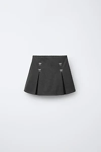 JUPE-SHORT À NŒUDS BRILLANTS