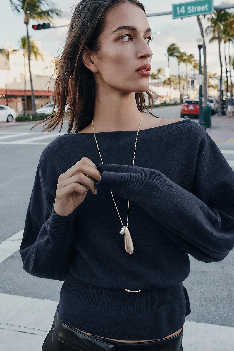 PULL EN MAILLE AVEC CEINTURE