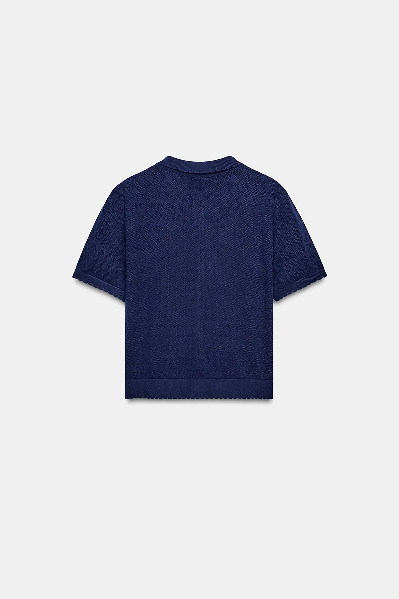 GILET EN MAILLE À MANCHES COURTES