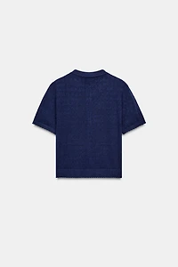 GILET EN MAILLE À MANCHES COURTES