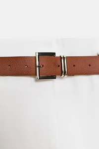 PANTALON AVEC REVERS ET CEINTURE