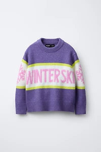 PULL EN MAILLE AVEC INSCRIPTION COLLECTION SKI