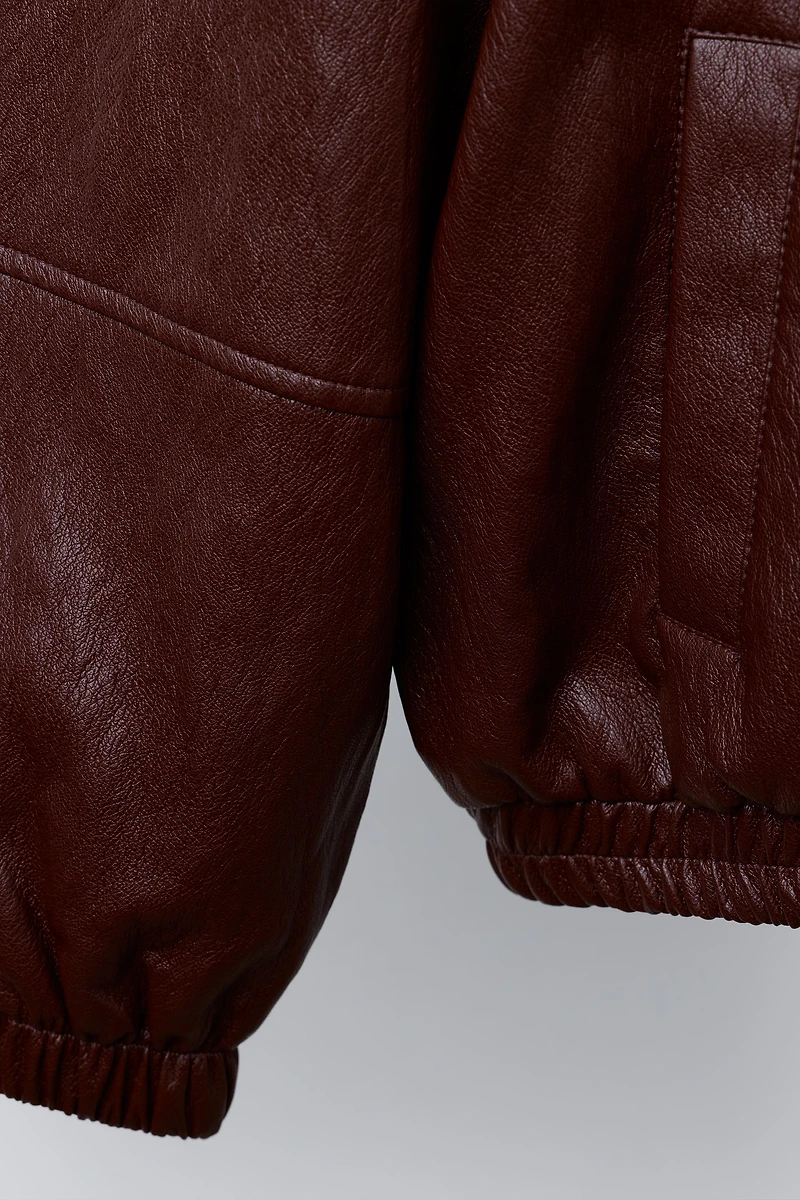 BLOUSON BOMBER EN MATIÈRE SYNTHÉTIQUE