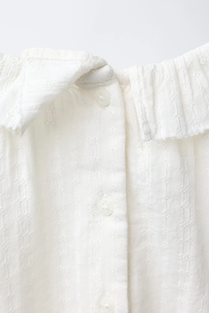 EMBROIDERED FAGOTING BODYSUIT