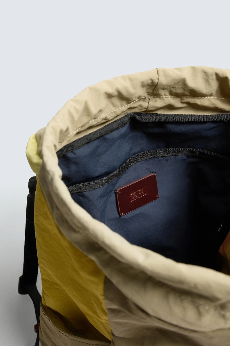 TECHNICAL BACKPACK WITH LEATHER DETAILS