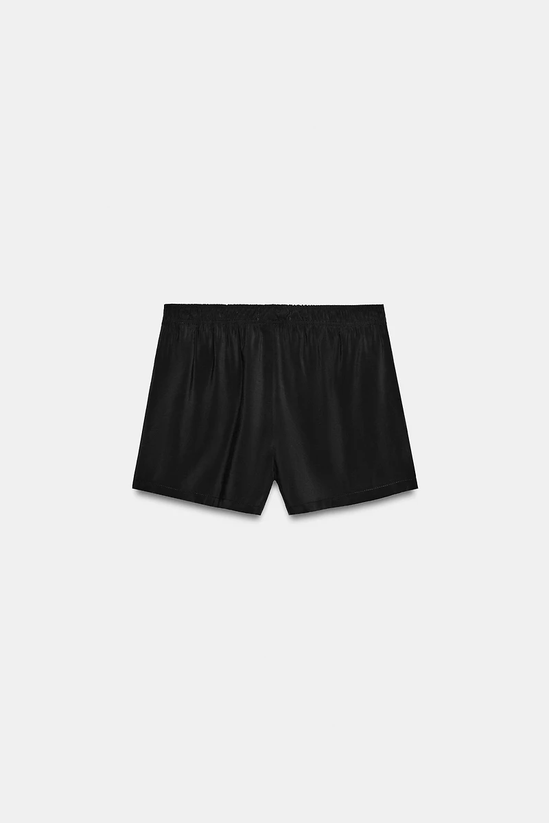 FLOWY SHORTS WITH ELASTIC WAIST AND BUTTONS