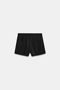 FLOWY SHORTS WITH ELASTIC WAIST AND BUTTONS