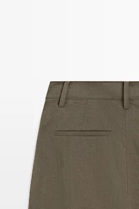 Technical wide-leg pleated pants