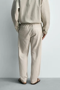 PLEATED STRAIGHT FIT PANTS