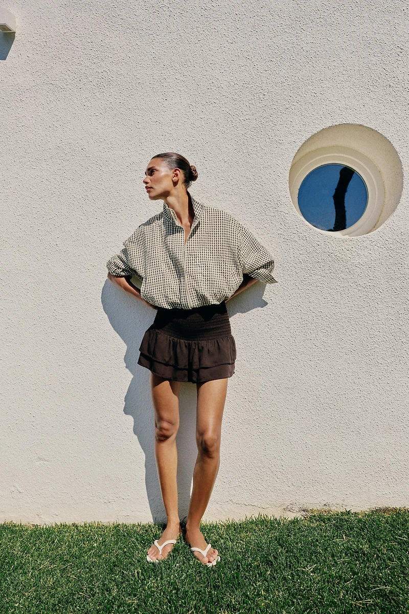 SMOCKED RUFFLE SHORTS