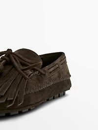 Split suede loafers with fringing and tassels