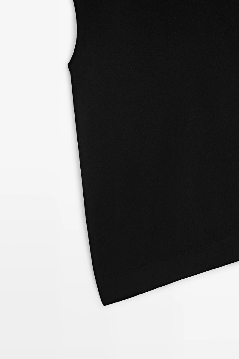 Asymmetric hem turtleneck top