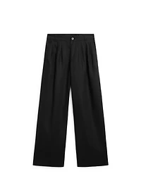 Wide-leg pleated linen trousers