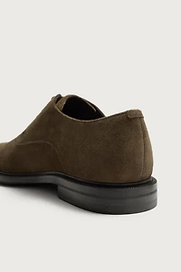 CHAUSSURES EN CUIR