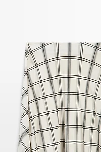 Asymmetric midi skirt with check detail