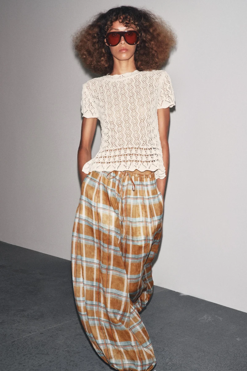 SHORT SLEEVE POINTELLE KNIT TOP