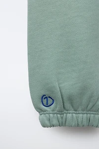 EMBROIDERED BALLOON PLUSH PANTS