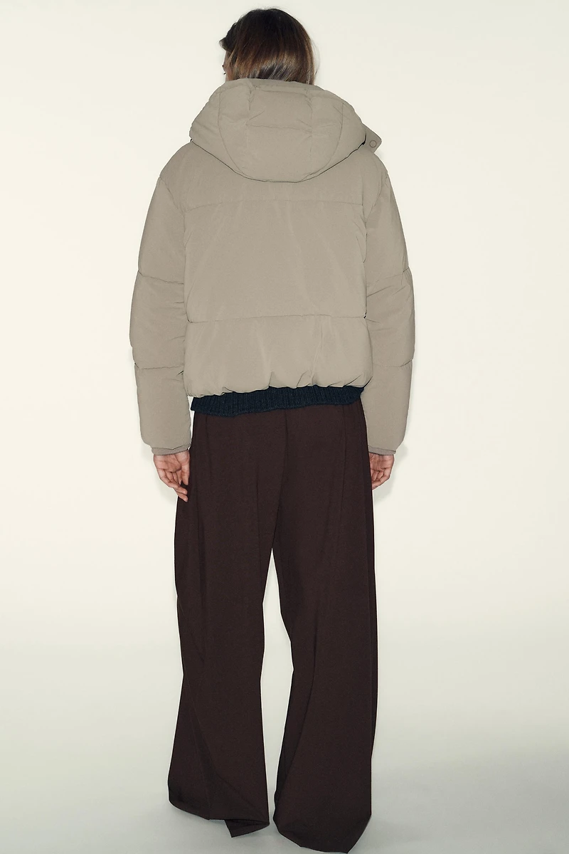 ANORAK COURT À CAPUCHE DÉPERLANT ET COUPE-VENT