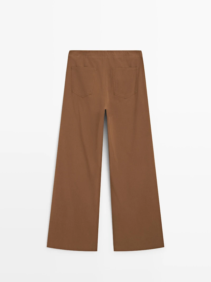 Flare fit cotton blend trousers