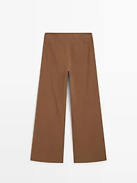 Flare fit cotton blend trousers