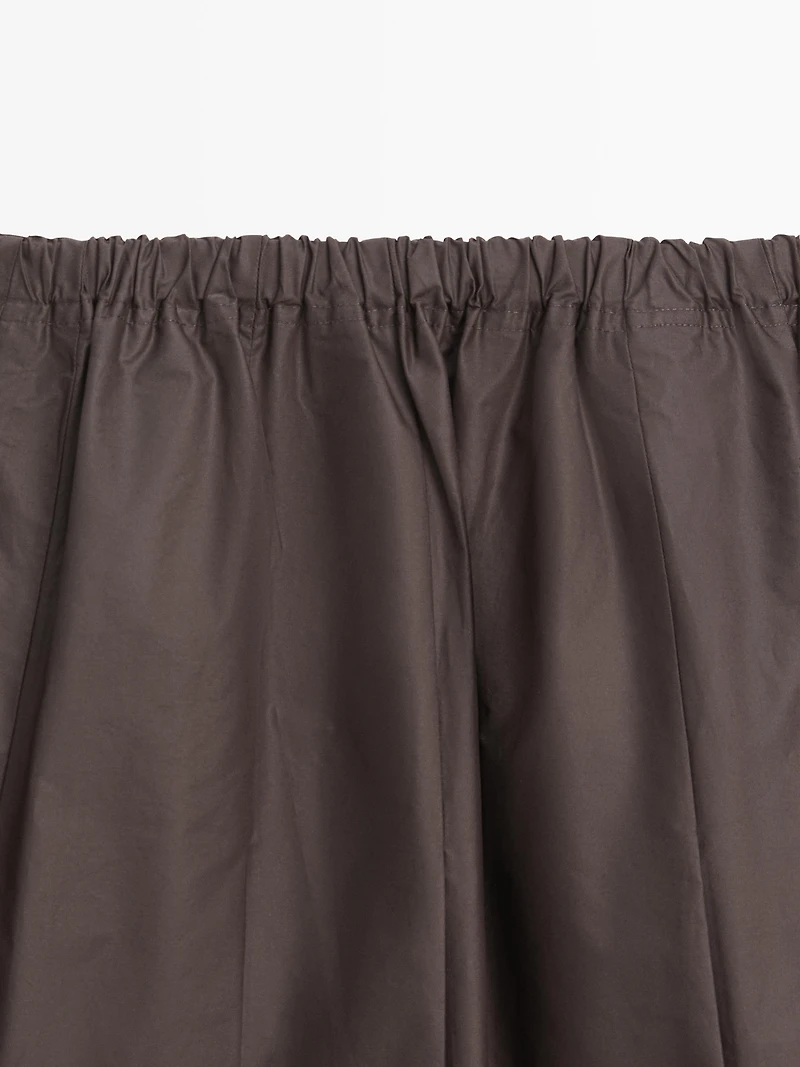 Box pleat technical fabric midi skirt