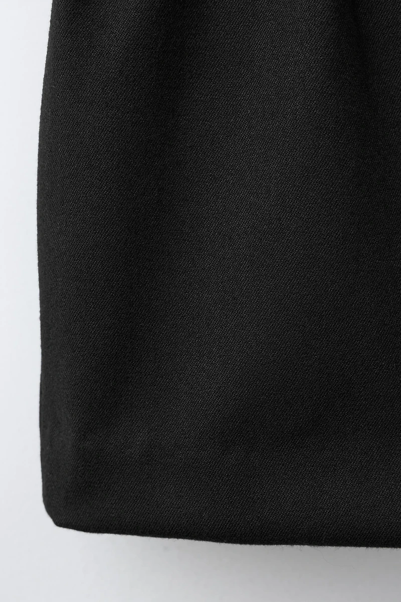 BUCKLE SKORT