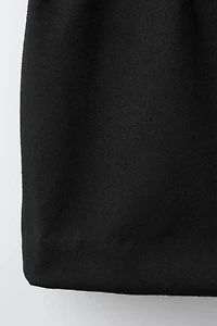 BUCKLE SKORT