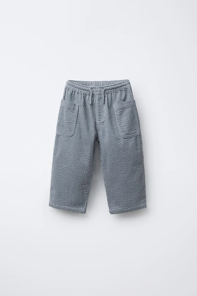PANTALON EN VELOURS CÔTELÉ À POCHES