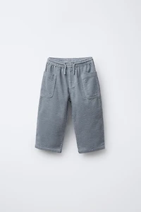 PANTALON EN VELOURS CÔTELÉ À POCHES