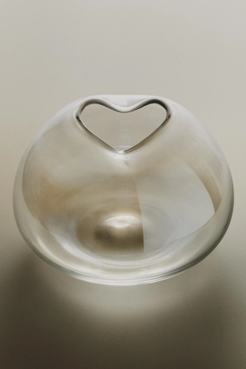 VASE WITH AN IRREGULAR LOW NECK