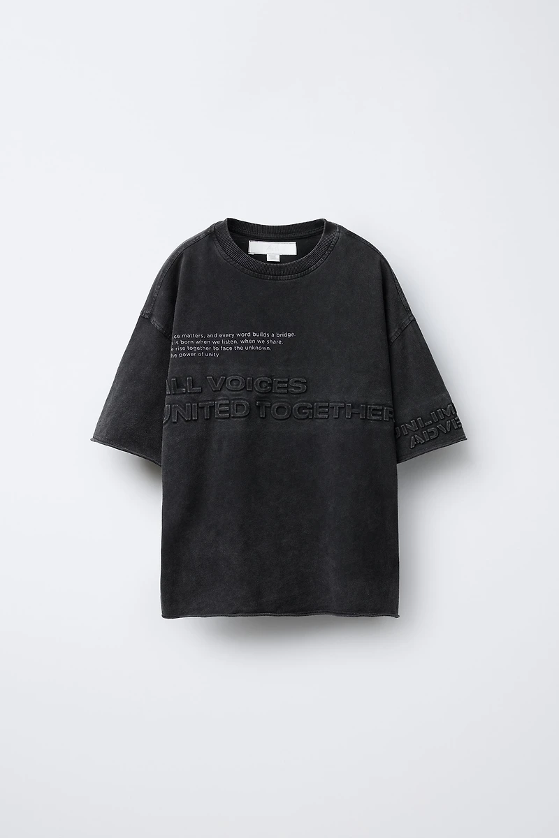 EMBOSSED TEXT T-SHIRT