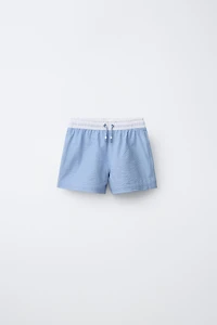 AGES 6-14 / LABEL SWIM SHORTS