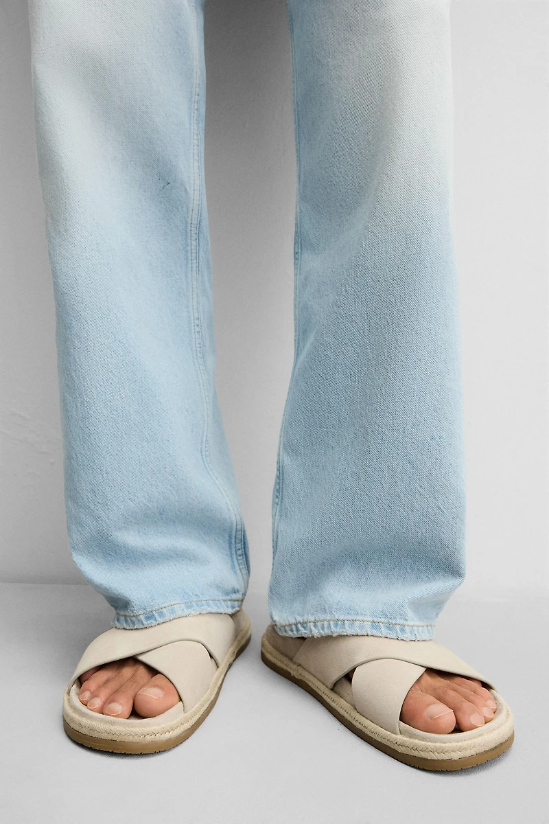 CROSSED LEATHER SANDALS
