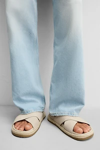 CROSSED LEATHER SANDALS