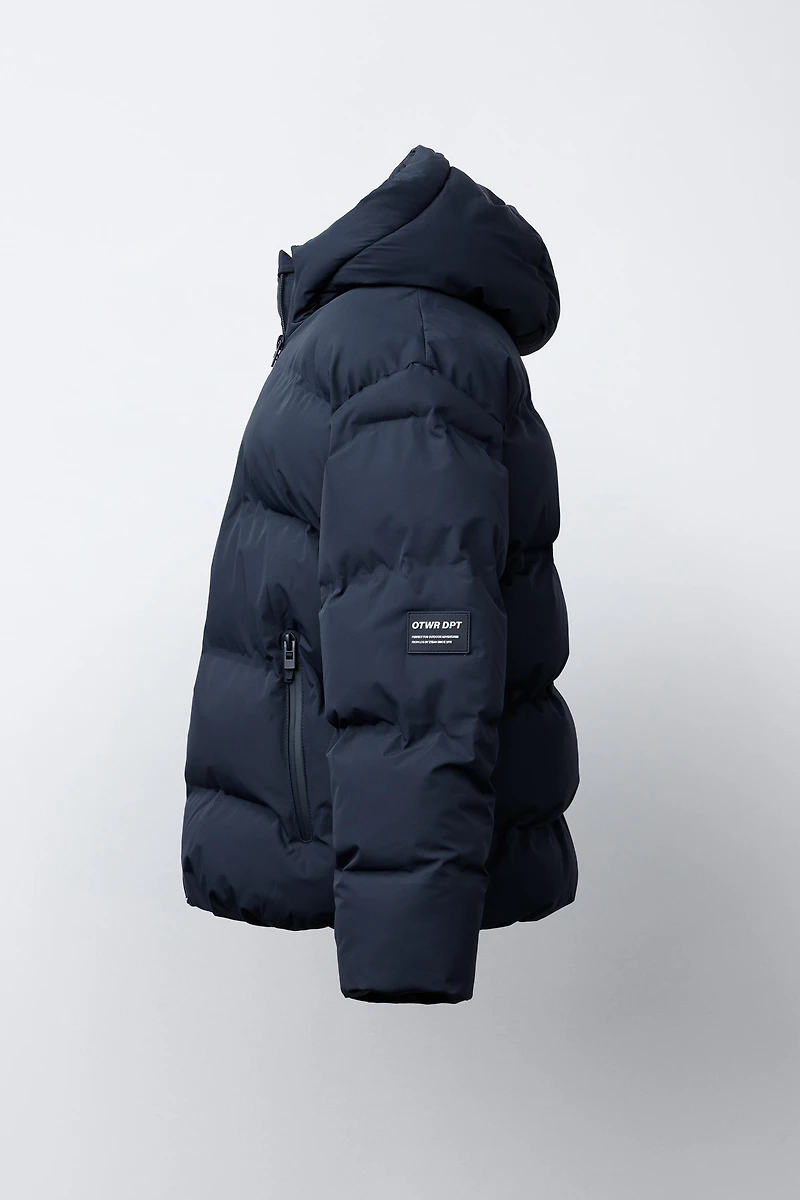 MANTEAU MATELASSÉ ÉTIQUETTE WATER REPELLENT
