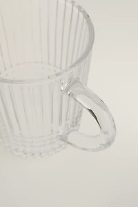 GLASS MUG WITH A RAISED GEOMETRIC DESIGN
