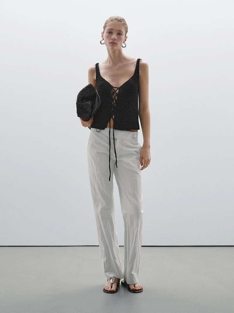Pantalon slim taille basse avec boucles