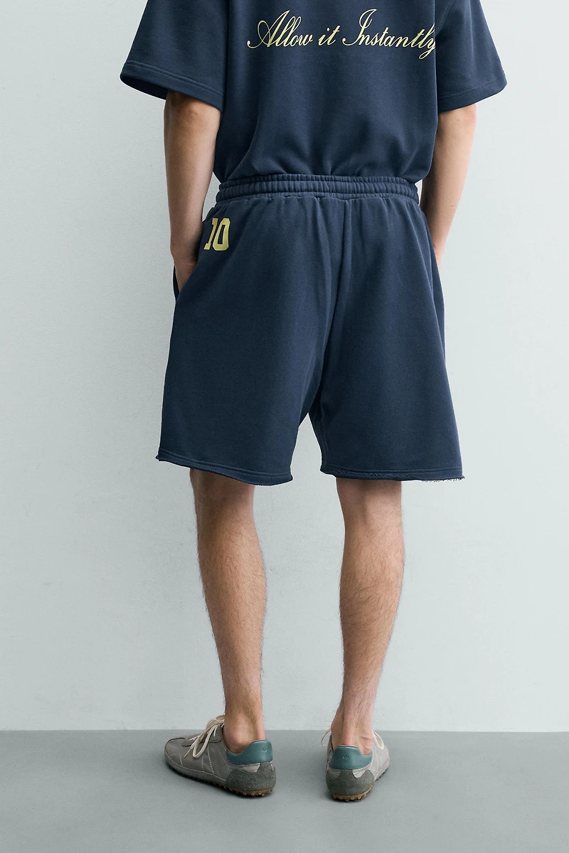 GRAPHIC PRINT JOGGER SHORTS