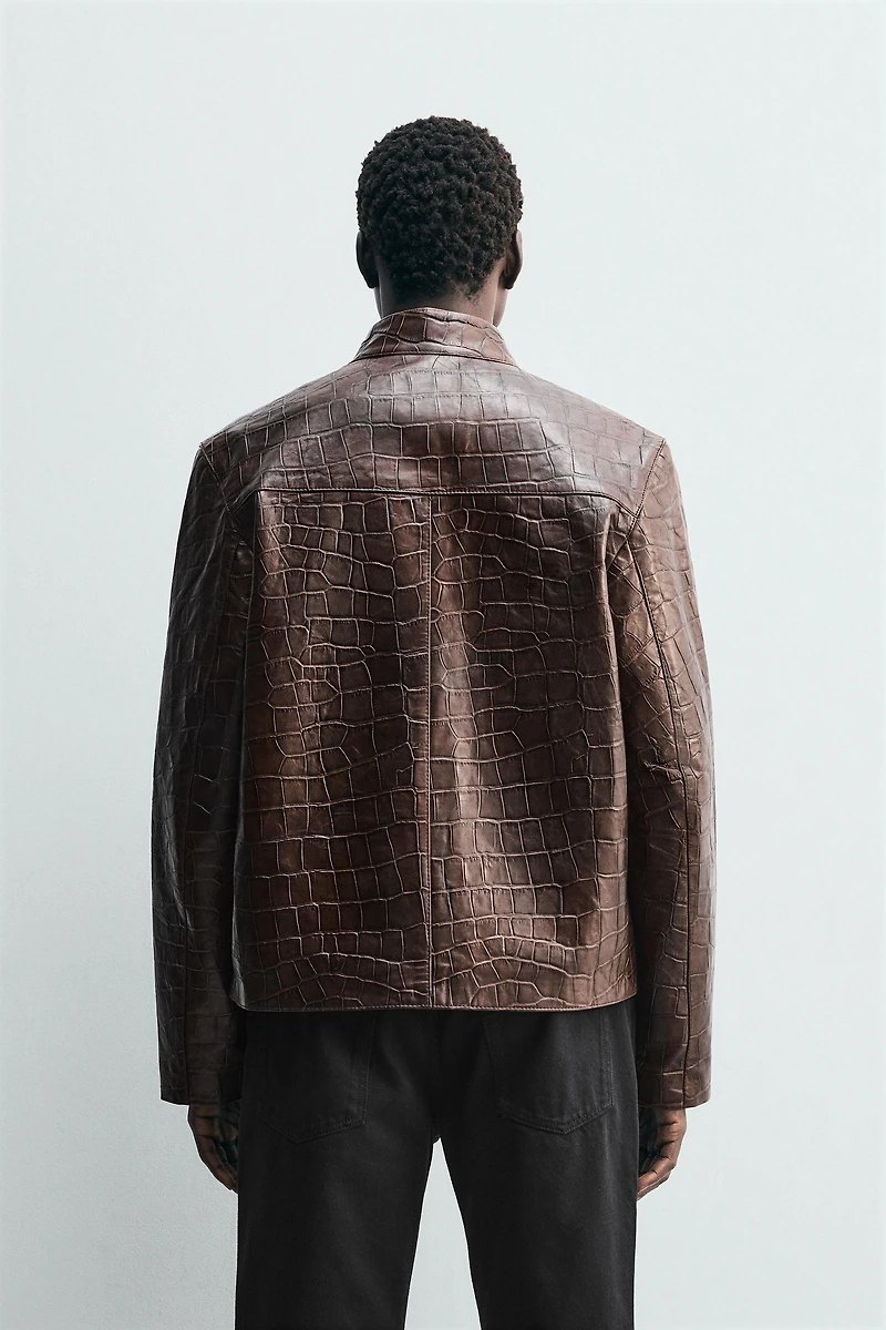 BLOUSON EN CUIR GRAVÉ