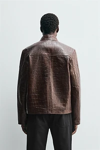 BLOUSON EN CUIR GRAVÉ