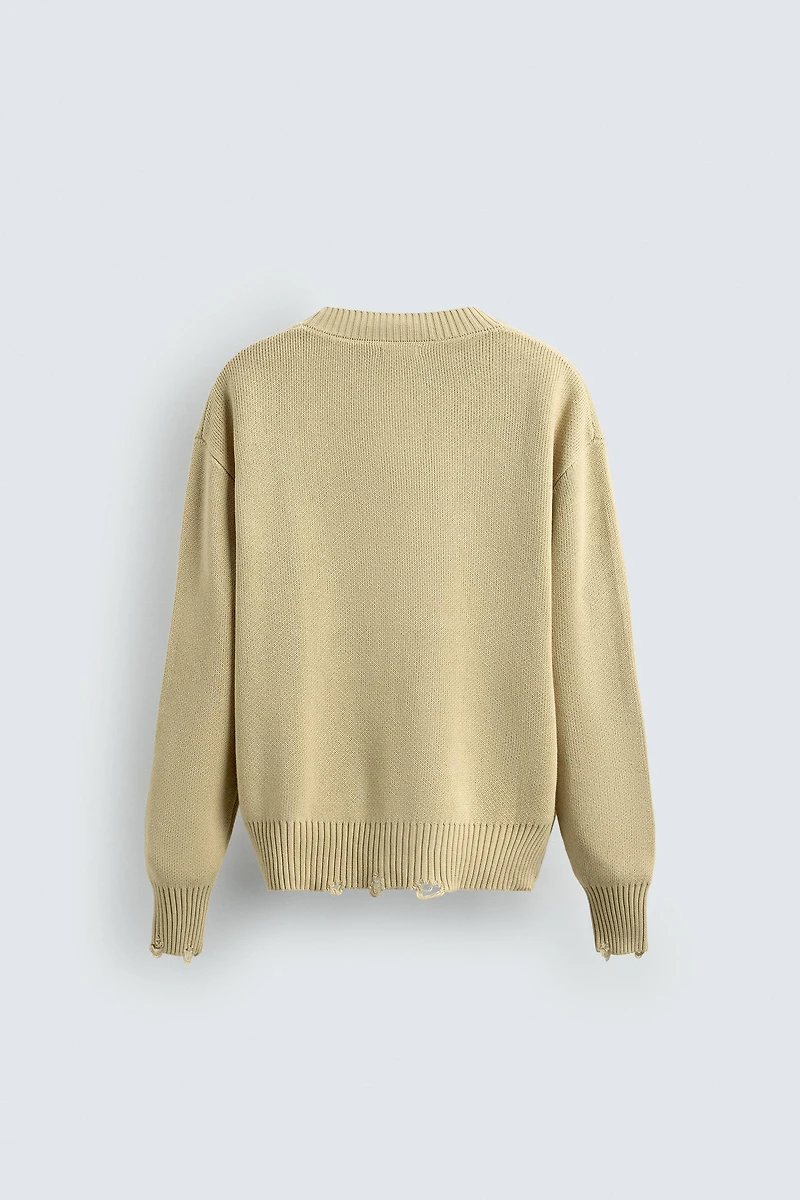 DISTRESSED RIBBED CARDIGAN