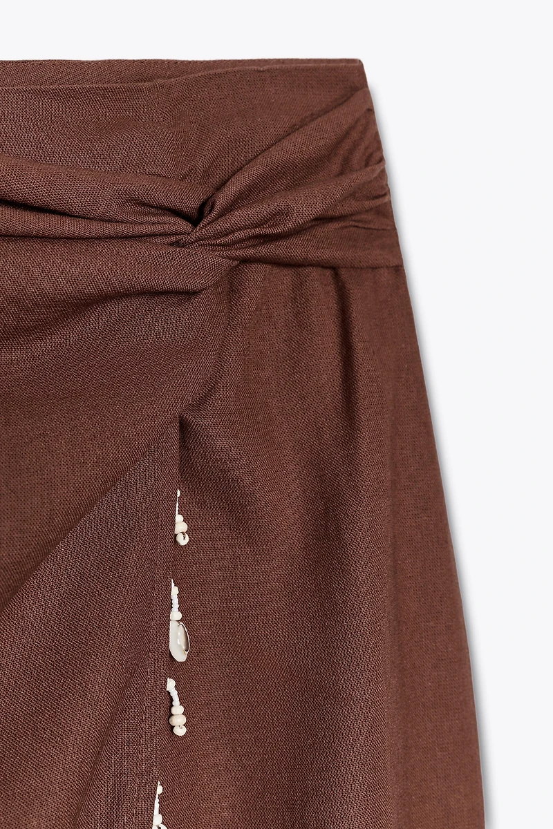 LINEN MIDI SKIRT WITH SHELLS