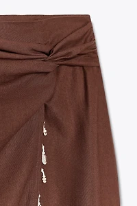 LINEN MIDI SKIRT WITH SHELLS