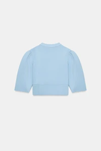 GILET EN MAILLE À MANCHES BOUFFANTES