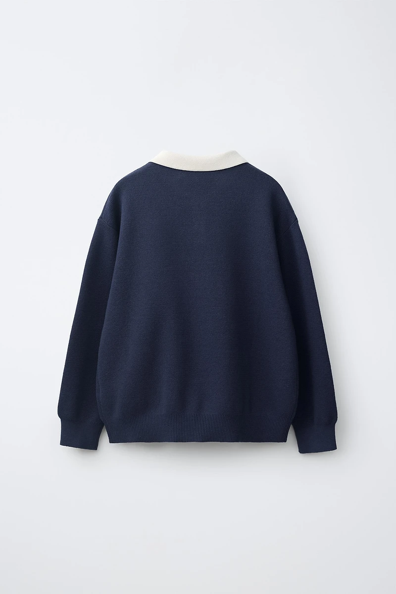 PULL POLO EN MAILLE VARSITY