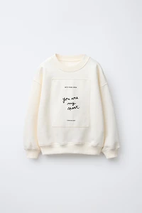 PATCH AND FLOCKED TEXT SWEATSHIRT