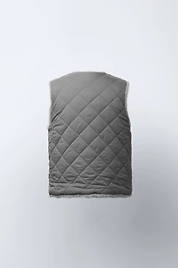 GILET RÉVERSIBLE EFFET FOURRURE
