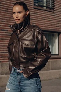 VESTE COURTE MATIÈRE SYNTHÈTIQUE