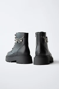 LACED ANKLE BOOTS WITH CHARMS